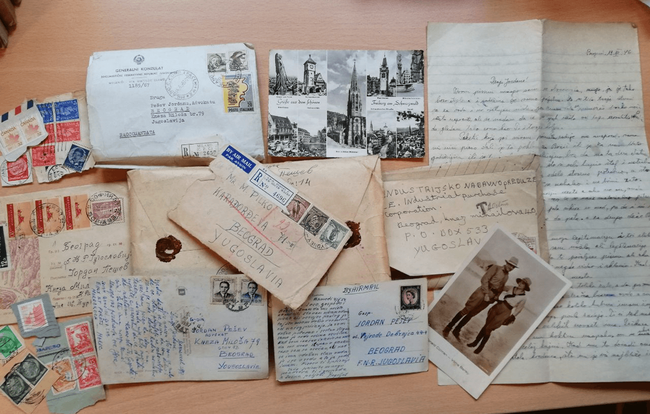 A collection of handwritten letters and postcards
