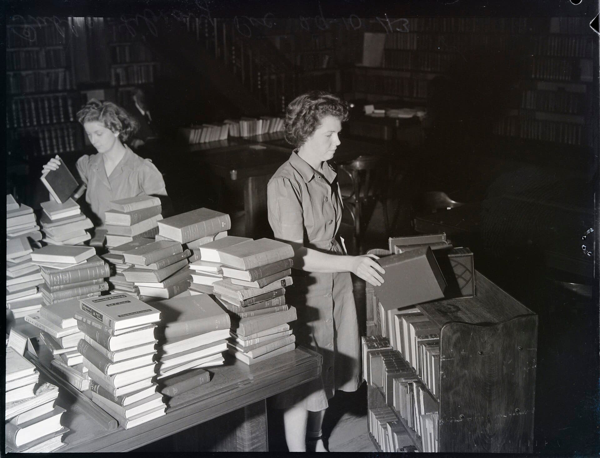 Stacked books prepared for a lending library in Sydney